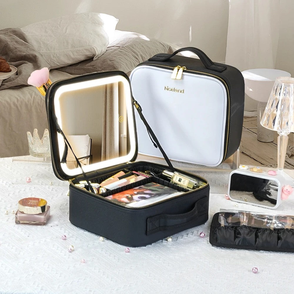 Trousse de maquillage LED noire ouverte à côté de la trousse blanche fermée, montrant les deux finitions côte à côte